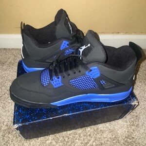 Jordan Black and Blue Air 4 Sneakers with Mesh Panels